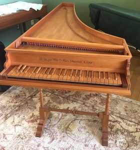 Image of a harpsichord viewed from front