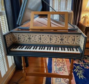 Front view of keyboard and music stand