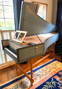Side angle front view of harpsichord
