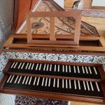 front view of harpsichord with music desk